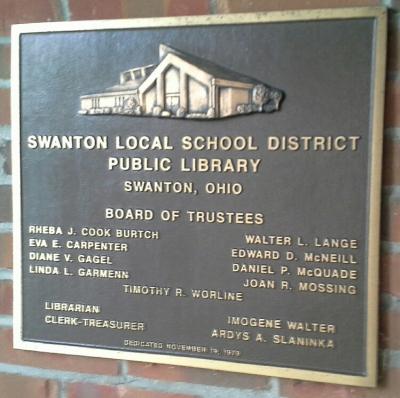 plaque listing the names of library board of trustees
